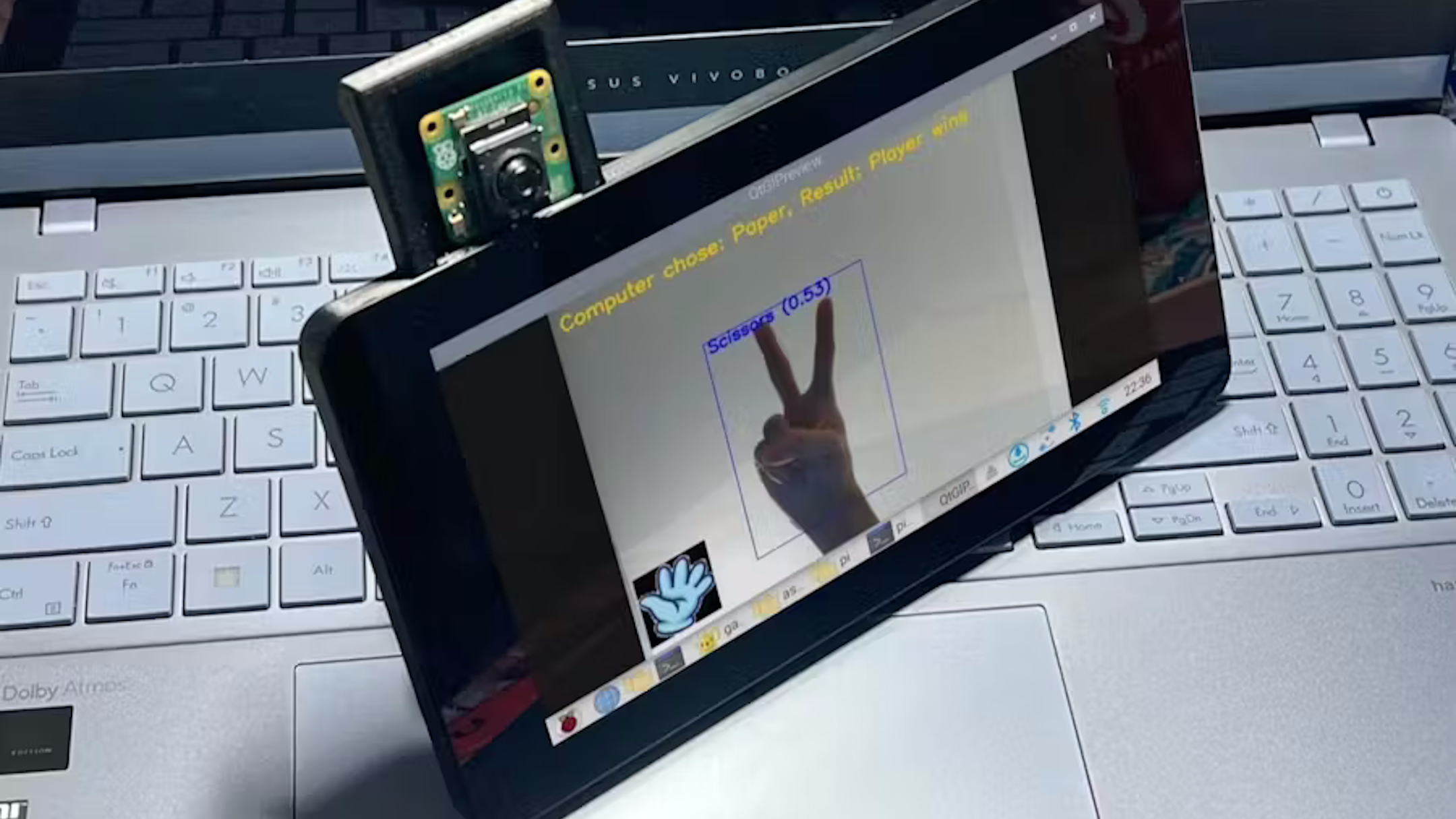A Raspberry Pi set up for a hand gesture recognition game.