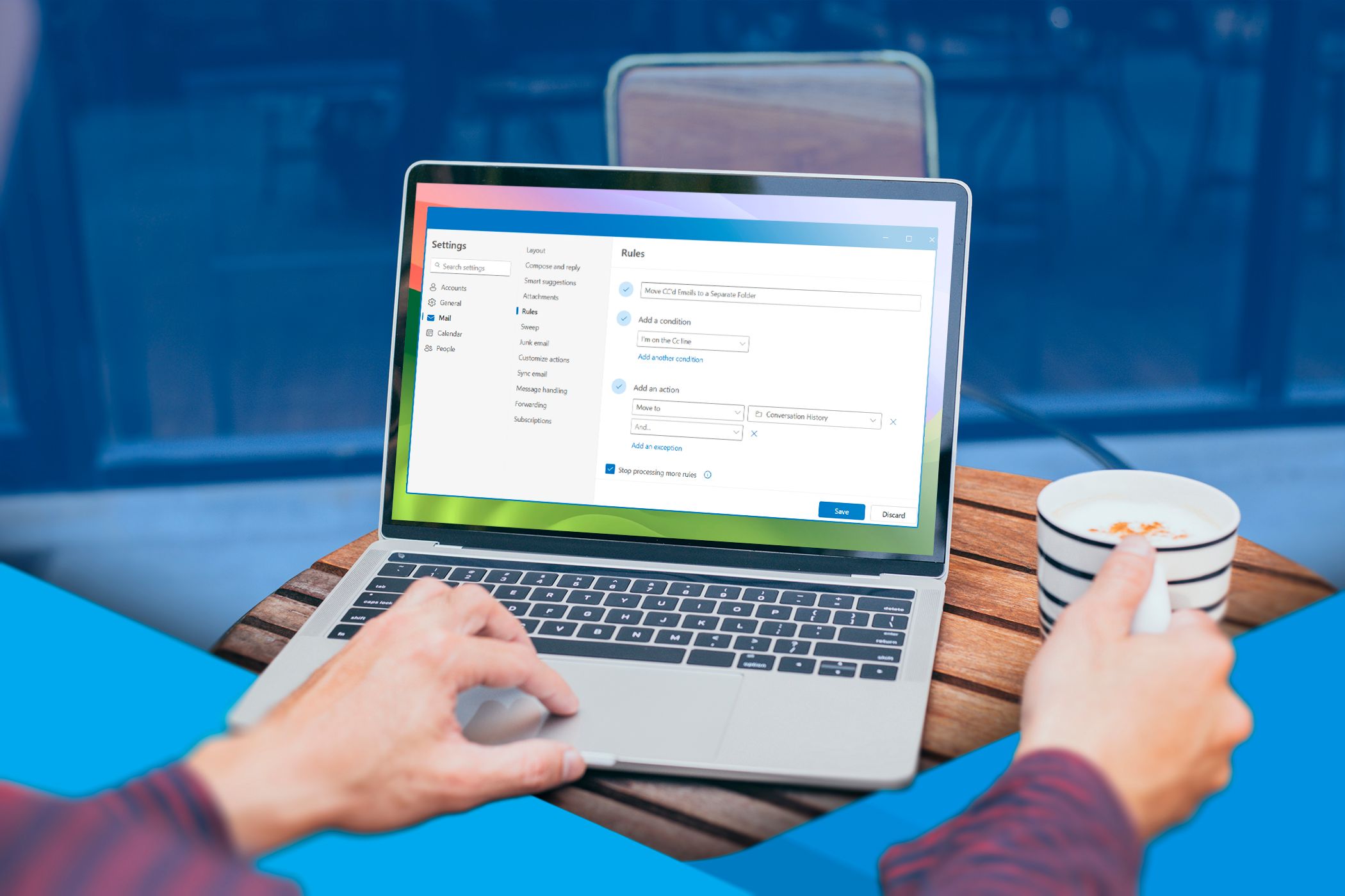 Laptop user setting up an email filter rule