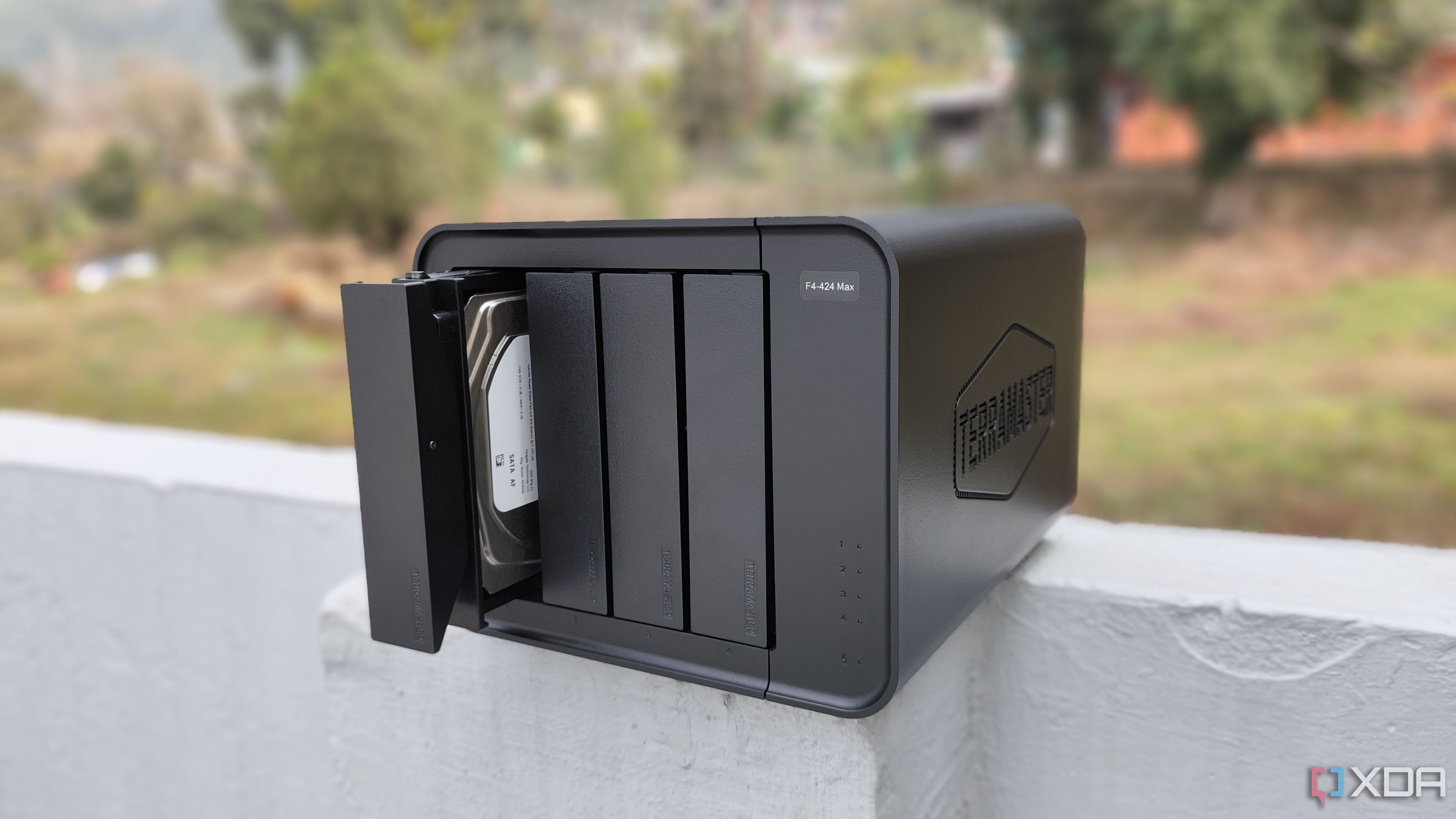 NAS device placed beside a desktop computer setup