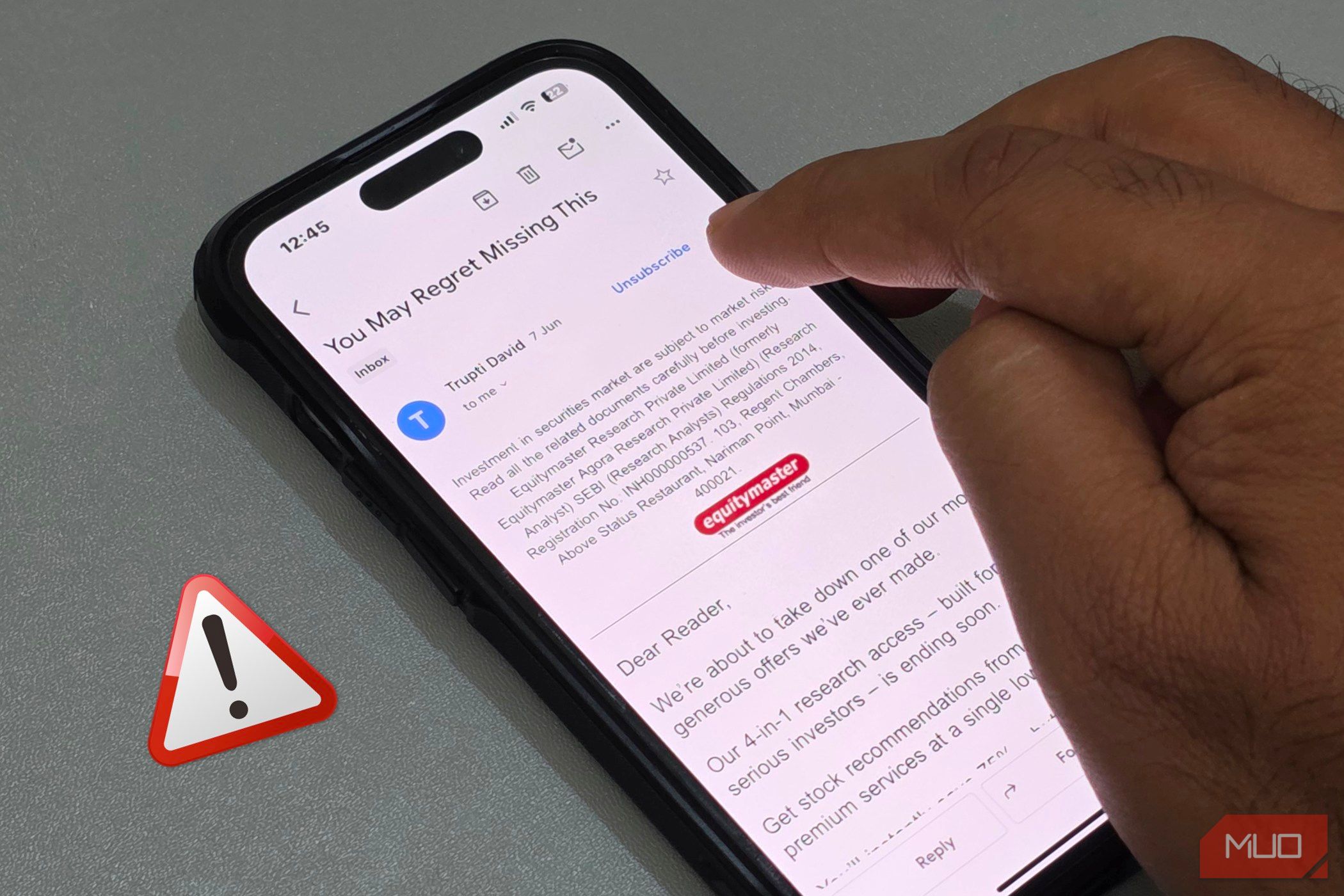iPhone user unsubscribing from spam email