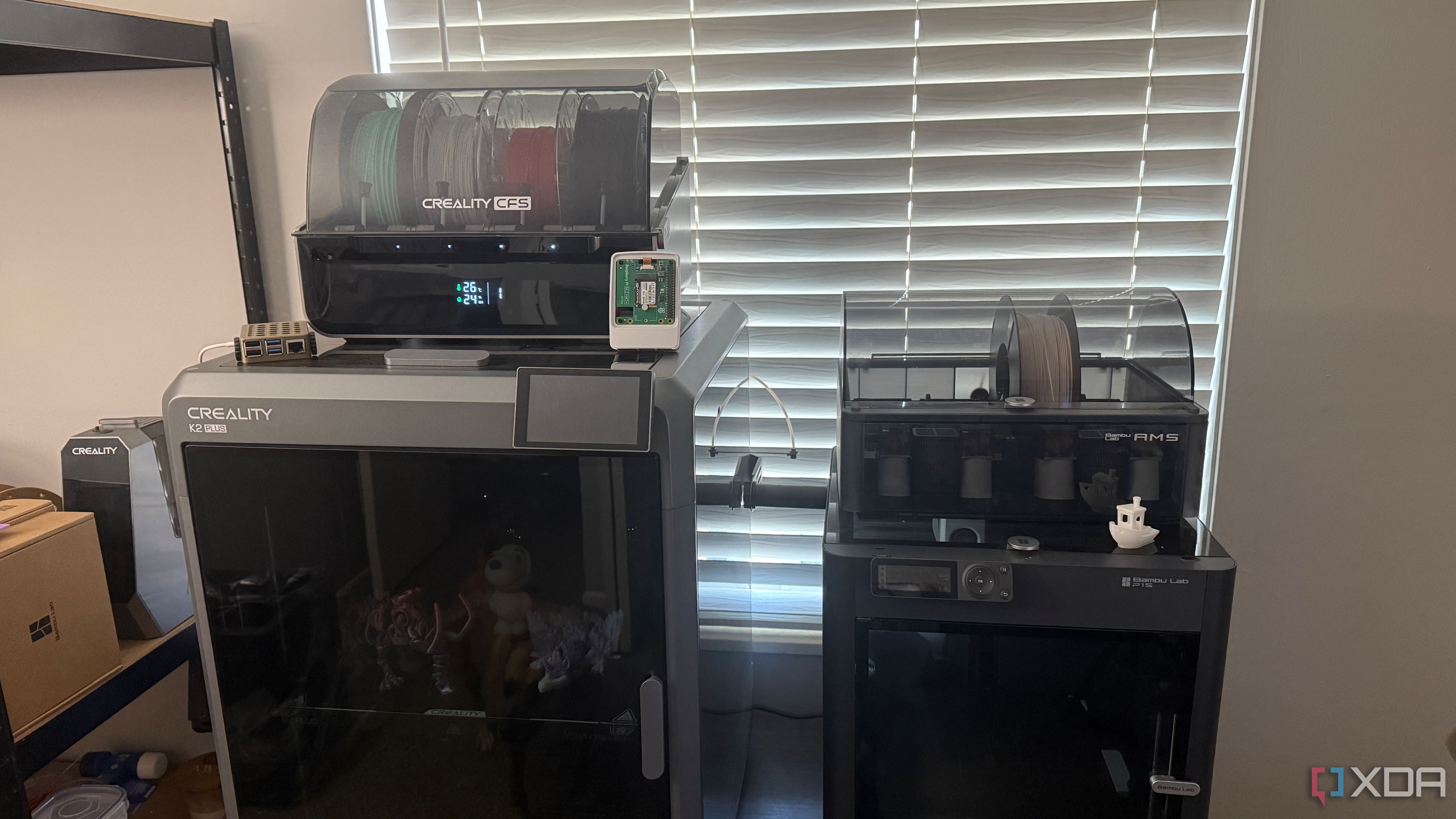 A variety of 3D-printed gadgets and Raspberry Pi devices on a desk