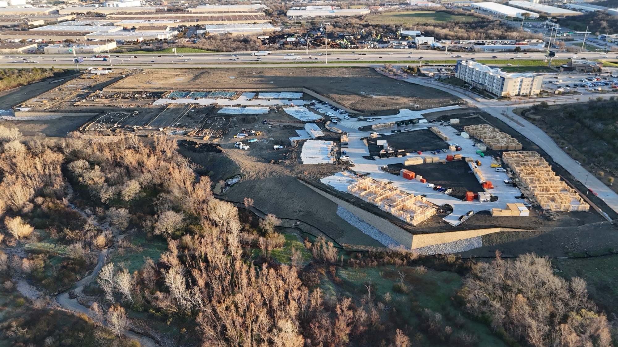 The Dallas skyline in the background, Colorado Boulevard to the right, Canyon Apartments in full swing across one of the city's larger garden-style sites.