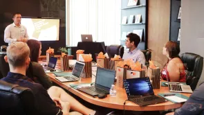 A meeting room full of people