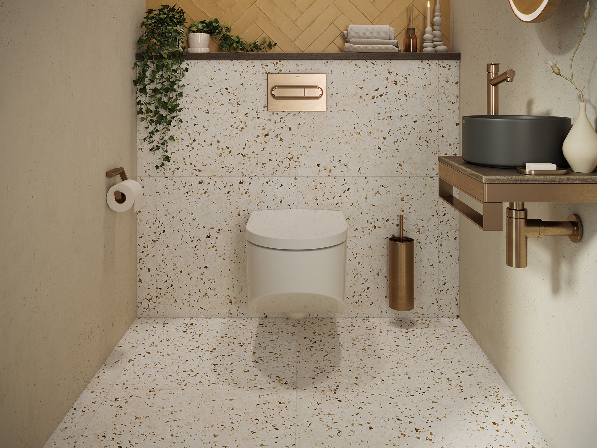 Complete toiletruimte met terrazzowanden en terrazzovloer, een wit wandcloset en messing accenten