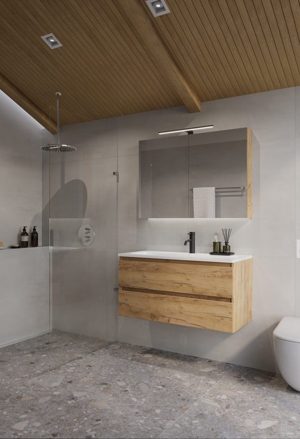 Badkamer met houten lattenplafond, eiken meubel en spiegelkast