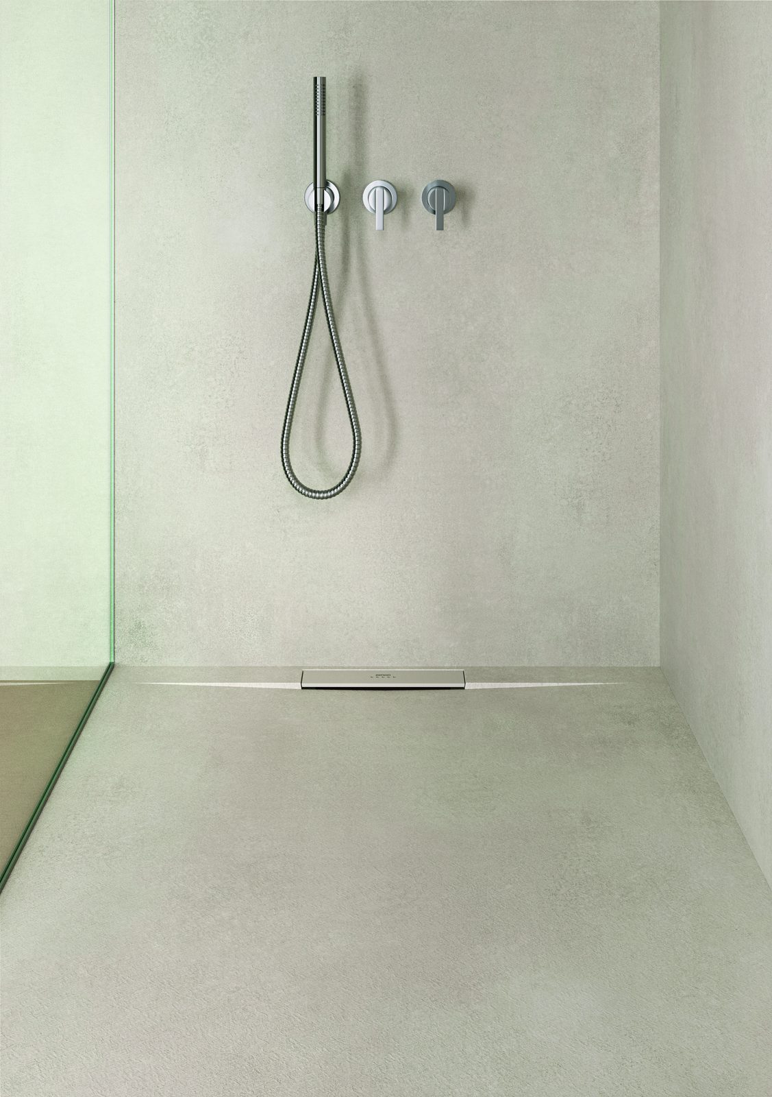 Douchegoot langs de wand in een drempelloze doucheruimte in betonlook