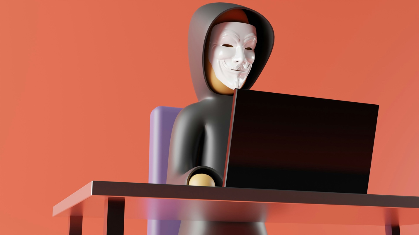 A person wearing a mask sitting at a desk with a computerAI-generated content may be incorrect.