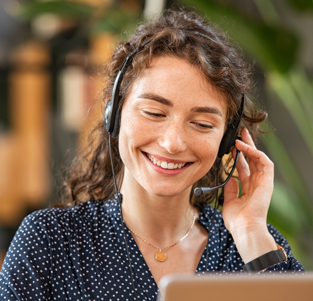 The supportive representative smiles warmly as she bids farewell to the customer, ensuring a positive conclusion to their interaction.