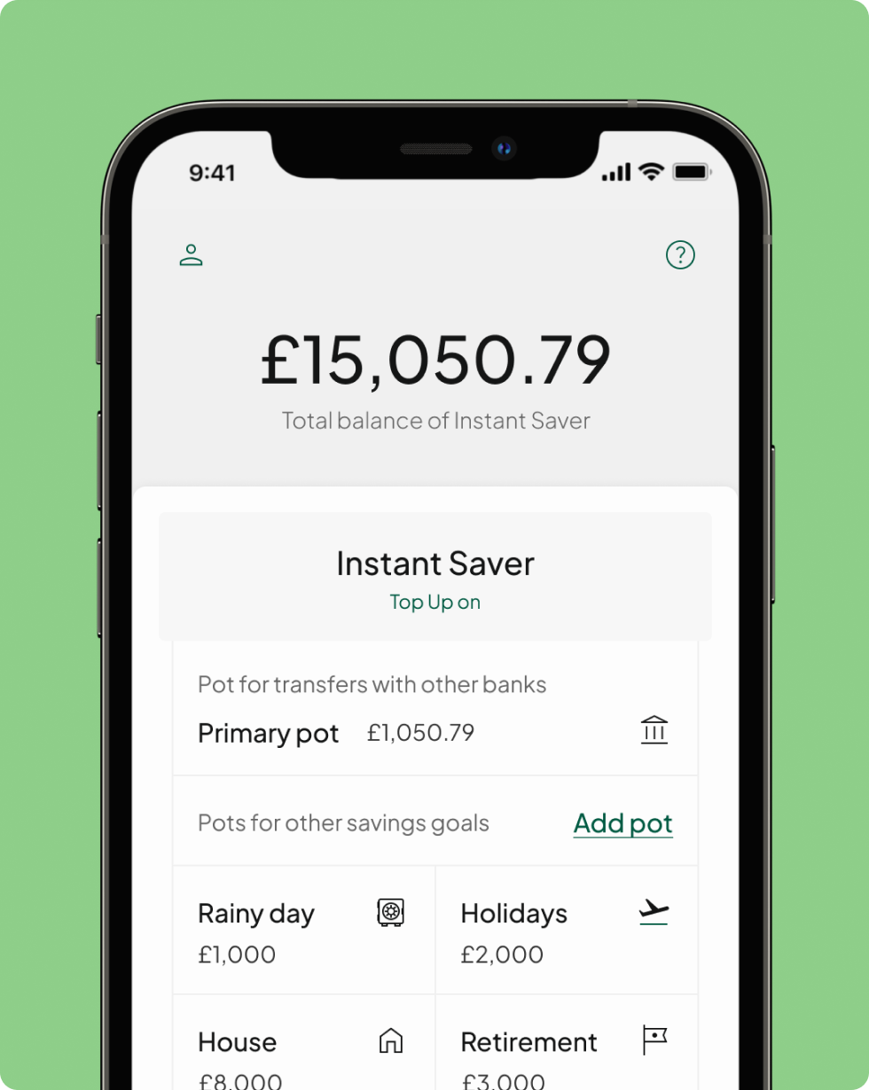 The Tandem App's smart phone screen displays an Instant Access Savings account, simplifying savings towards diverse financial goals.
