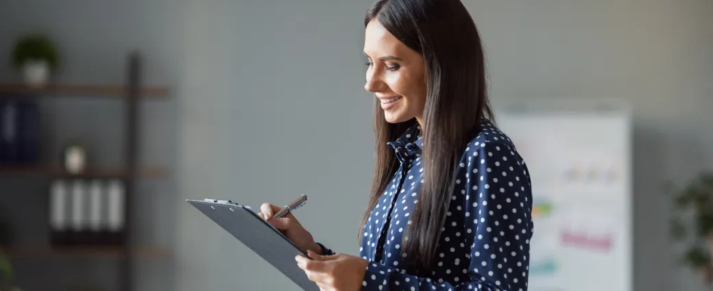 Smiling woman reviewing returns solutions