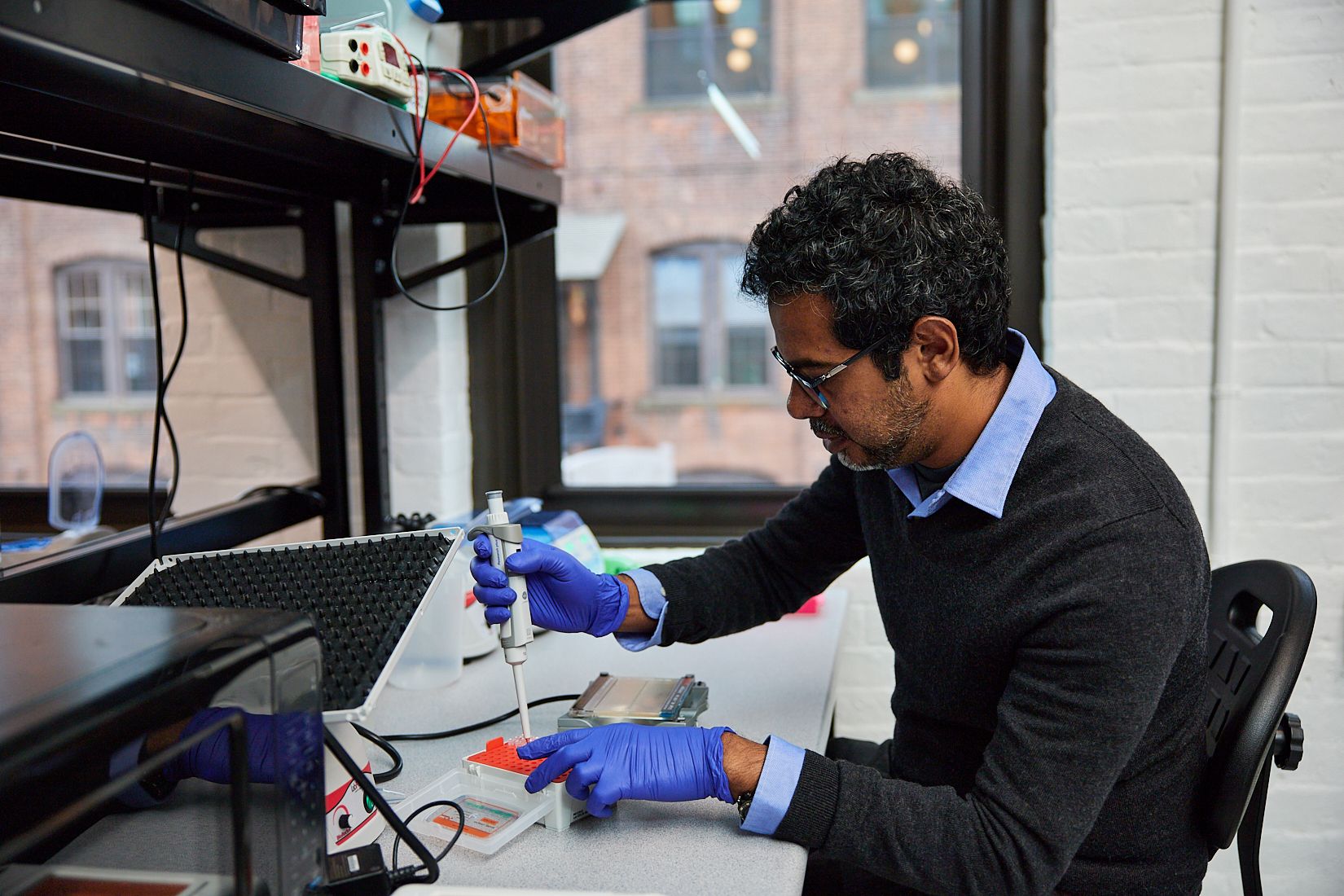 PEI scientist works in New Haven facility (1).jpg