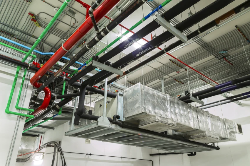 Commercial fire protection infrastructure with sprinkler piping and mechanical systems.