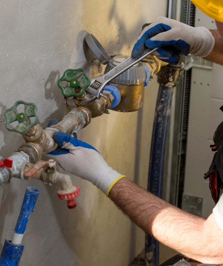 Croft Electric technician using ServiceBox on a tablet at a commercial job site.
