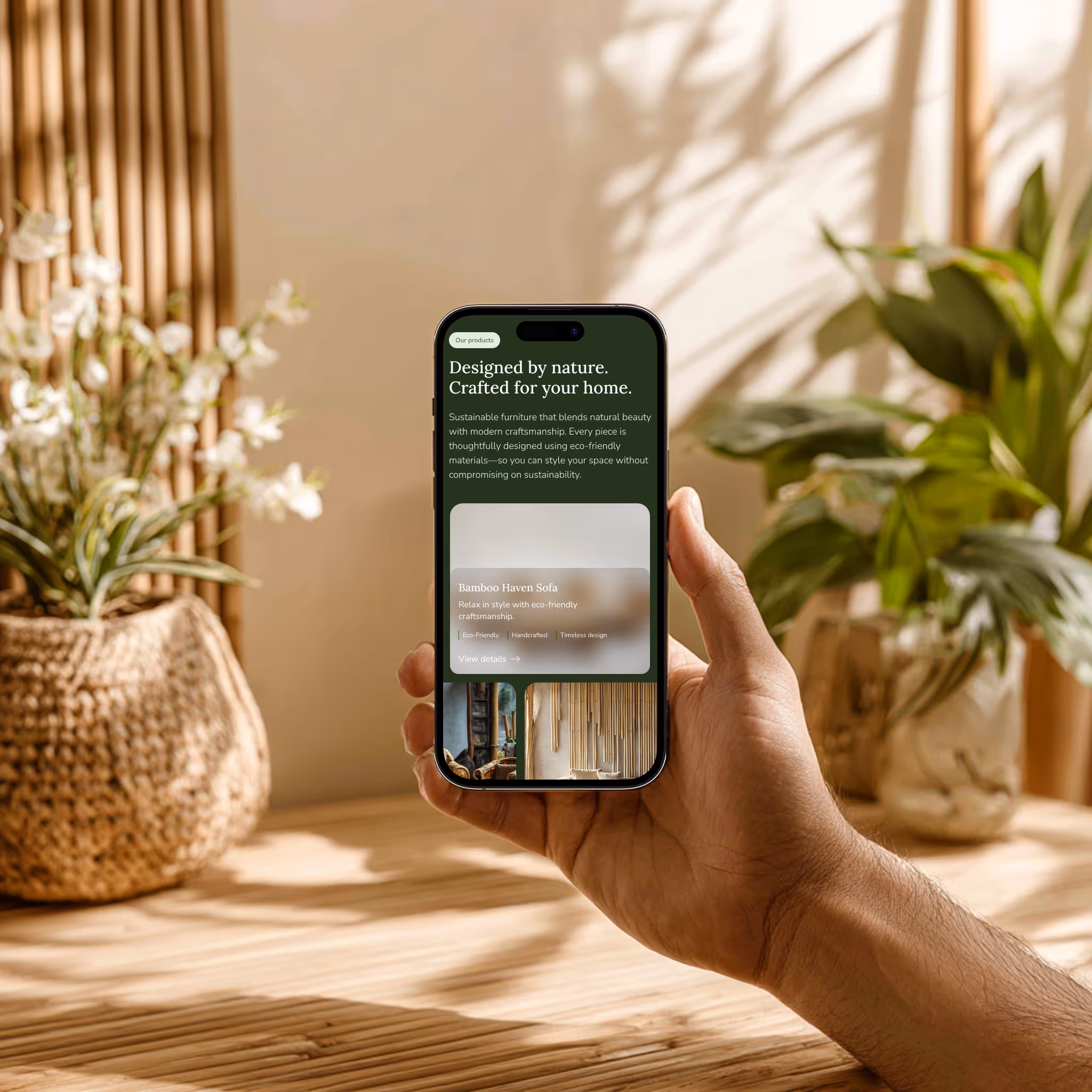 Mobile view of a sustainable furniture product page held in a hand, surrounded by natural textures, indoor plants, and warm ambient lighting.