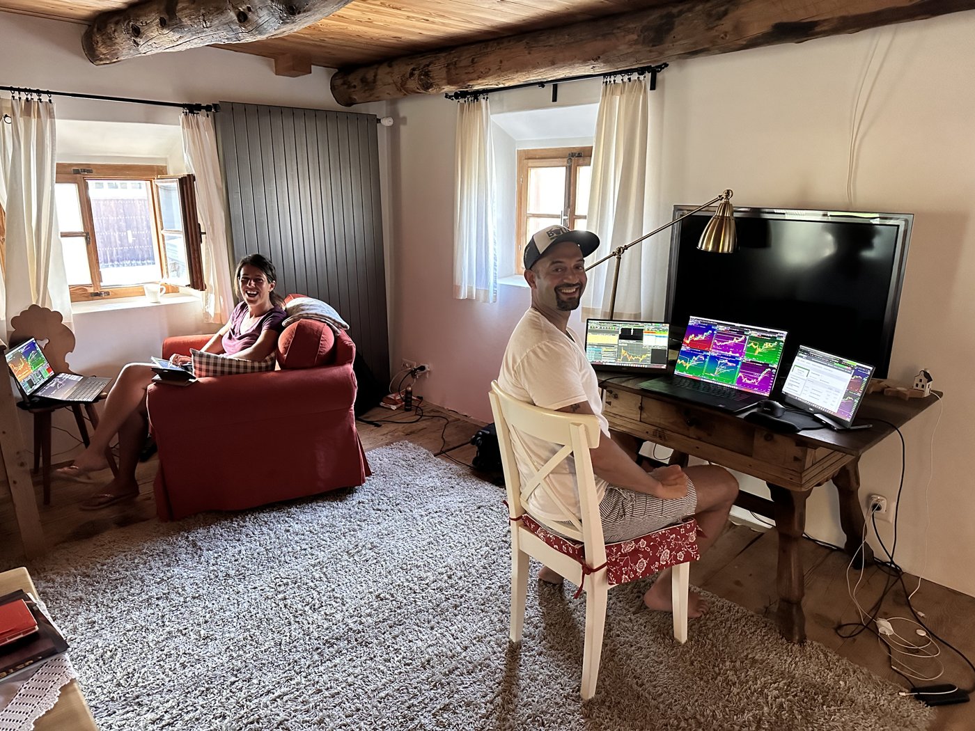 Kunal Desai travel day trading setup in Switzerland with Dell XPS 17 and two Dell portable monitors