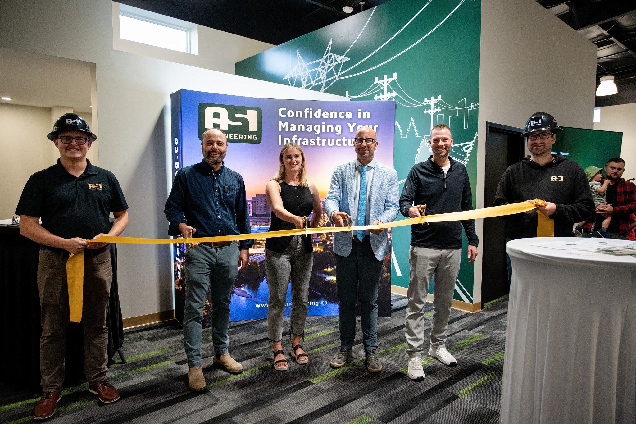 The ASI Engineering team at an office opening