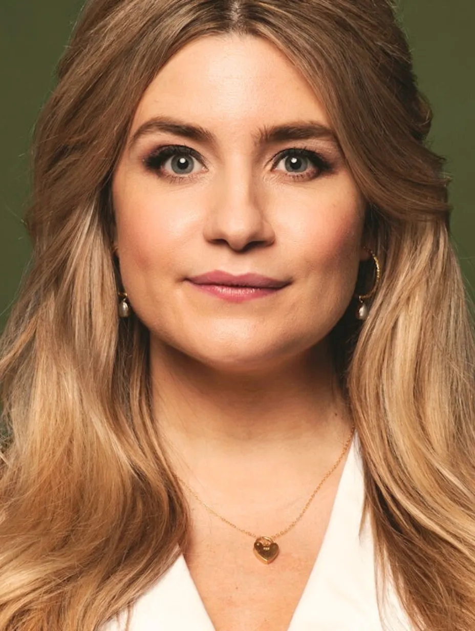 A close-up headshot of English stand-up comedian Harriet Kemsley, a performer in the London comedy scene.