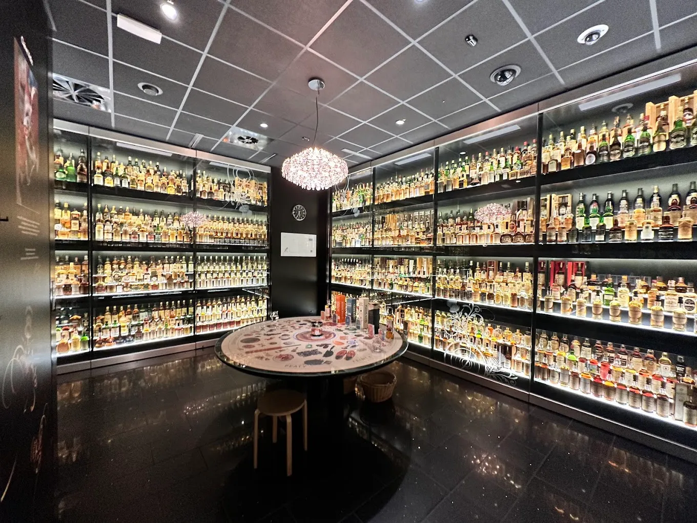 Scotch Whisky Experience Edinburgh showing extensive whisky bottle collection.