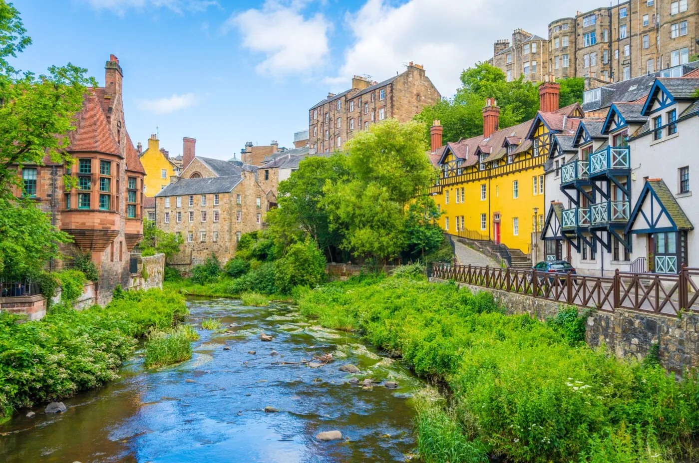 Dean Village Edinburgh showing colorful historic houses along Water of Leith.