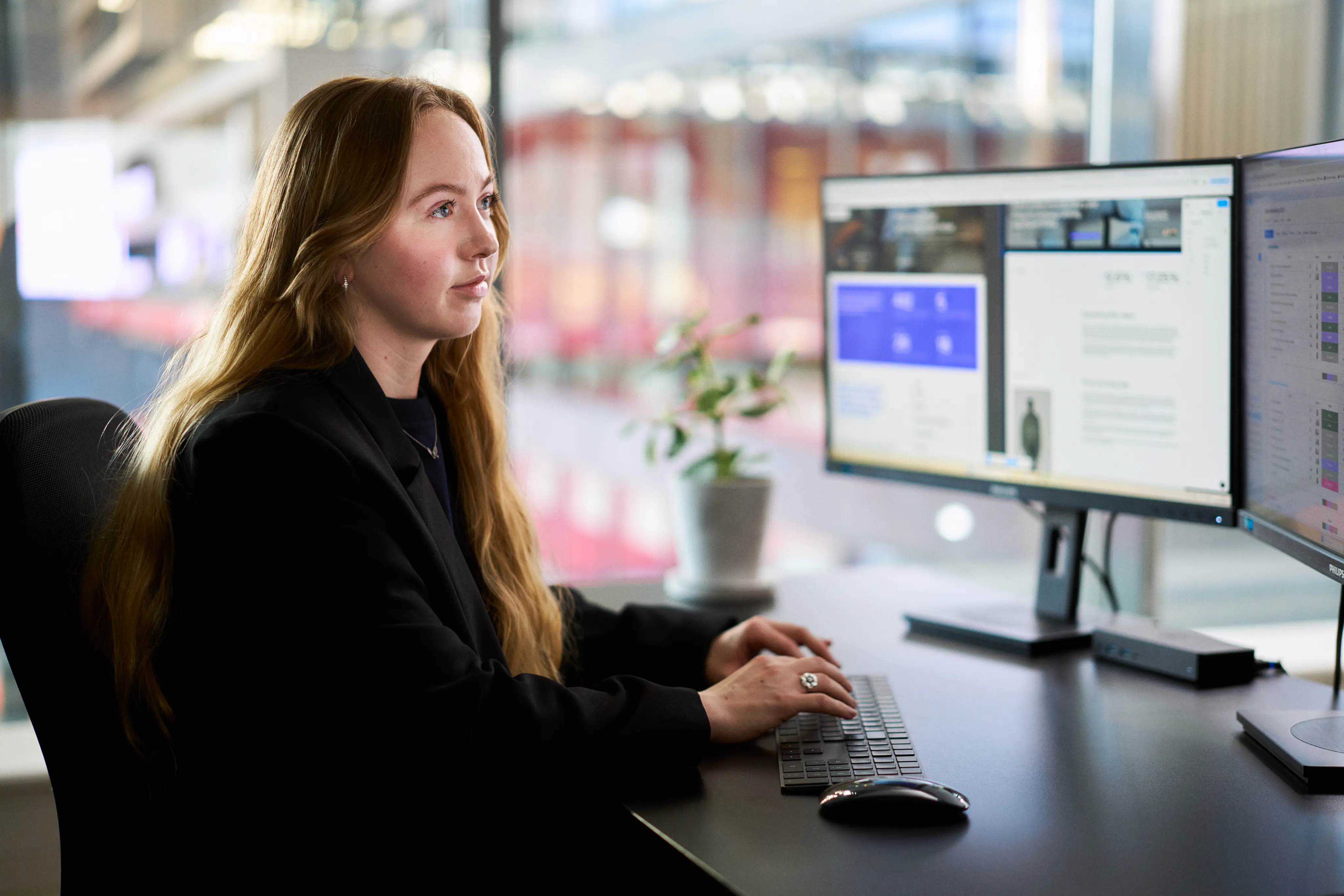 Obsidian colleague analysing data at a computer