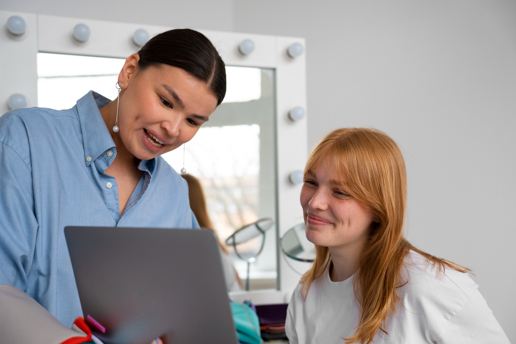 Optician helping patient choose frames