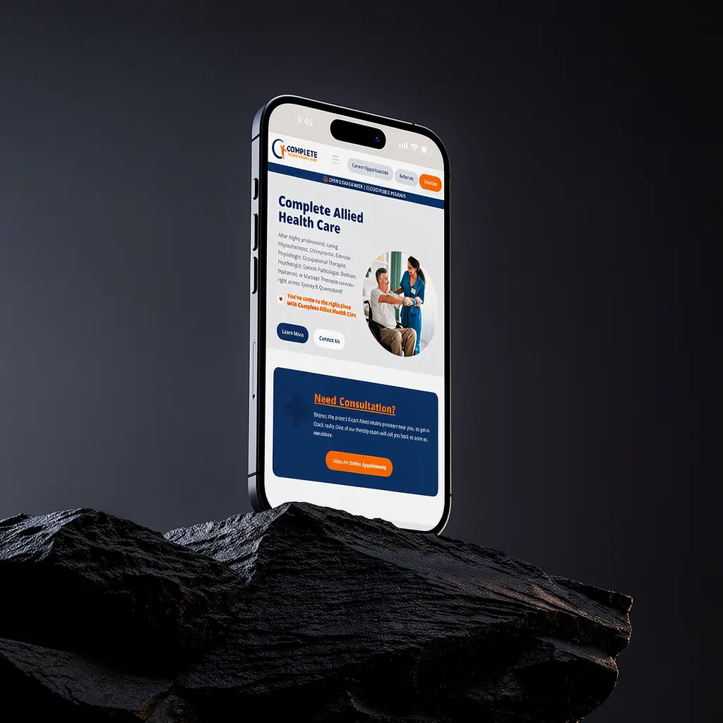 Complete Allied Health Care website displayed on an iPhone 16 mockup sitting on a dark slate rock surface