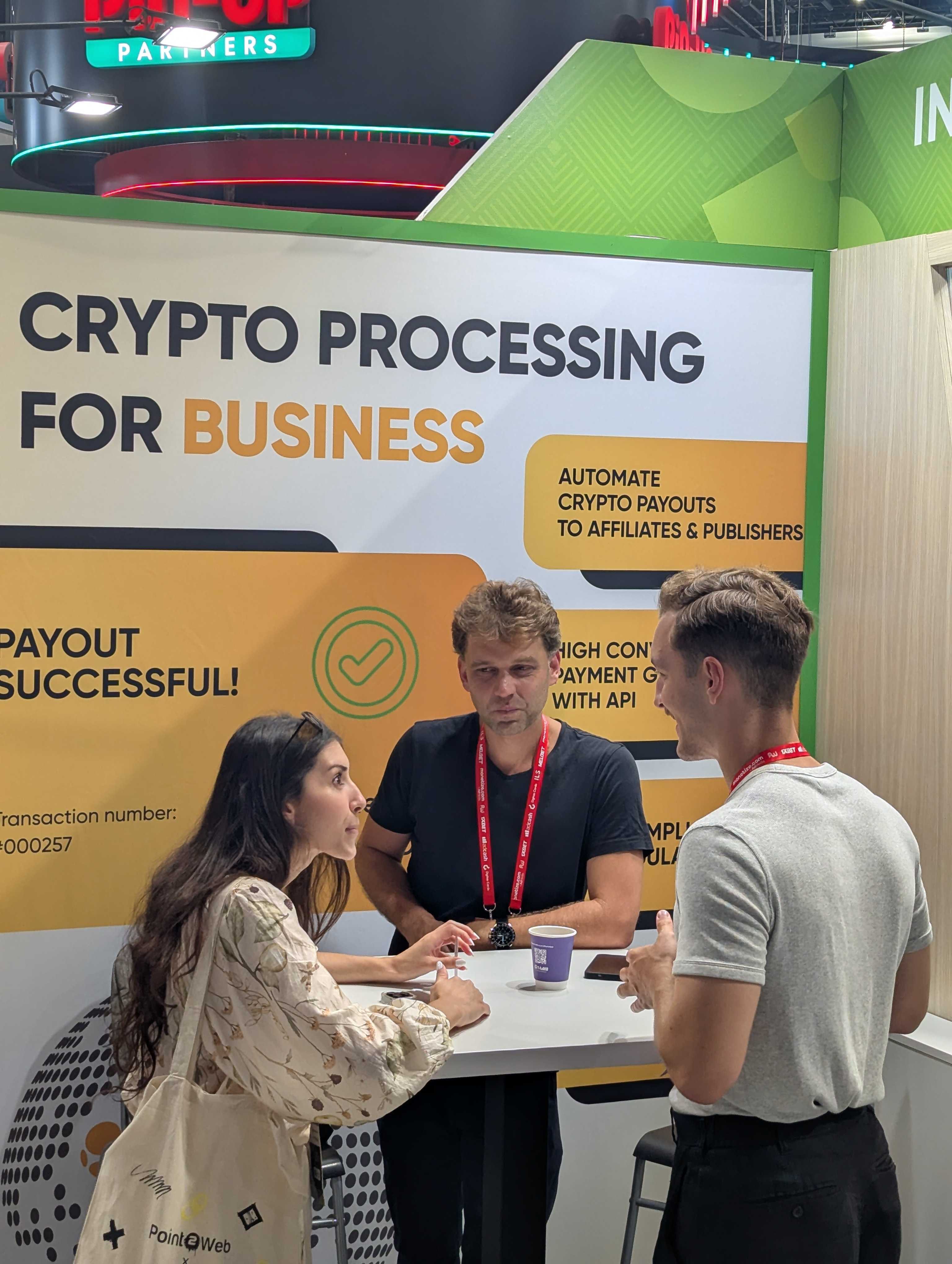 INXY Payments team meeting a visitor at Affiliate World Europe