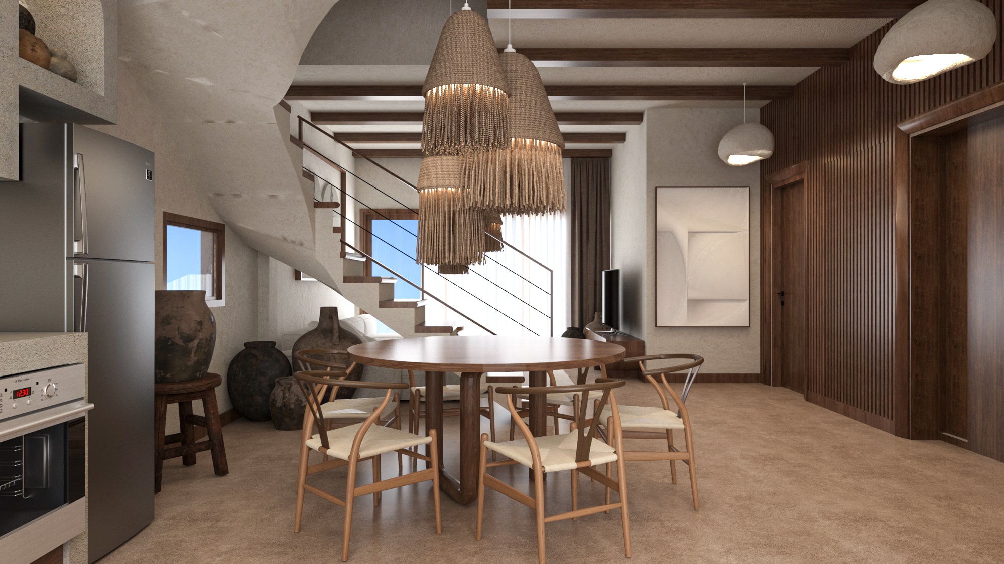 View from the dining area toward the entrance and living room in Asili Penthouse, with natural light, modern staircase, and view into the open living space.