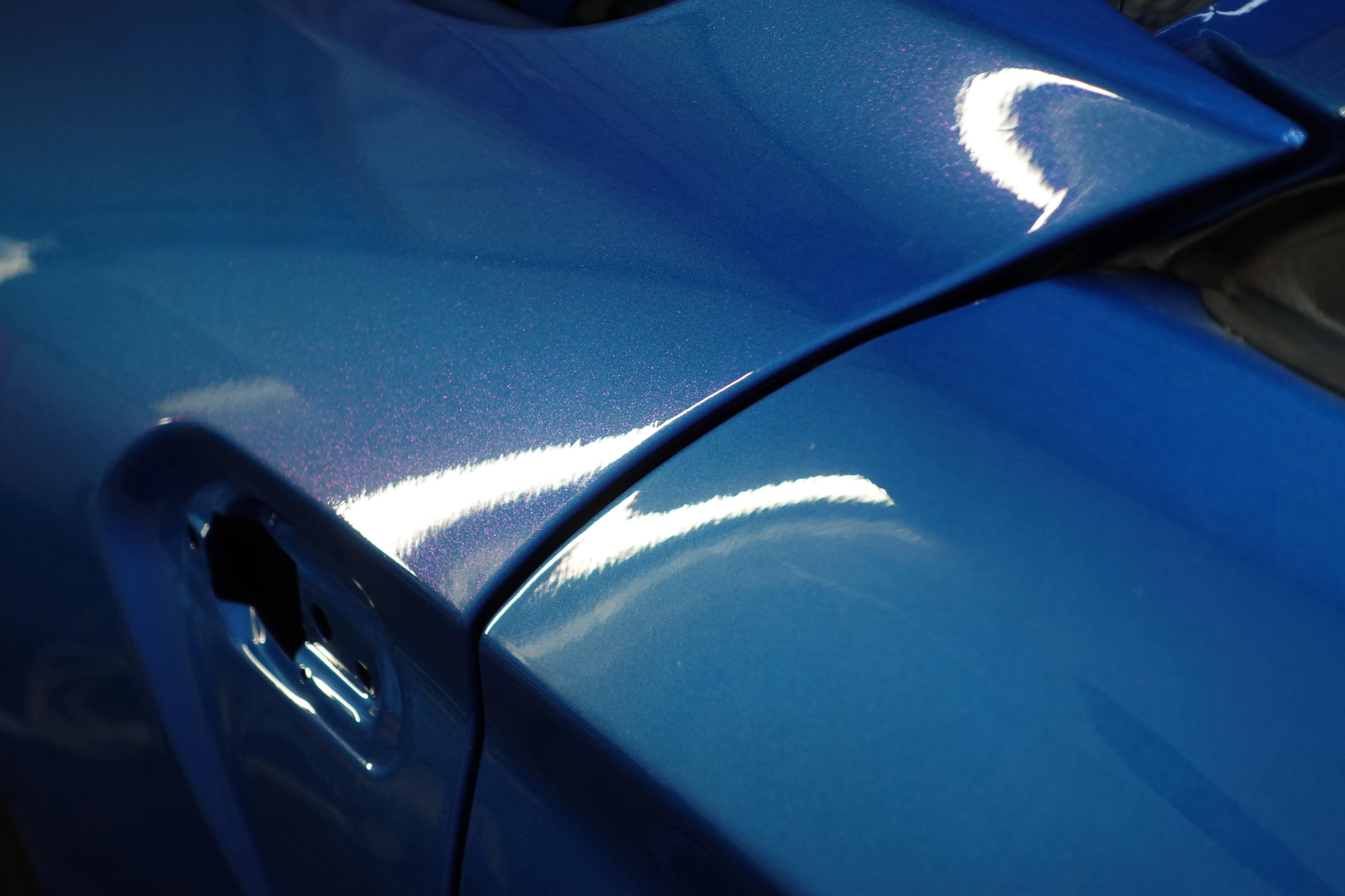 Full car PPF with ProFilm Blue Diamond, a transparent metallic PPF - giving a high gloss purple and blue metallic hue to the paint and protecting the original finish. Work completed at On Track Detailing in Reading, Wokingham , near to Basingstoke