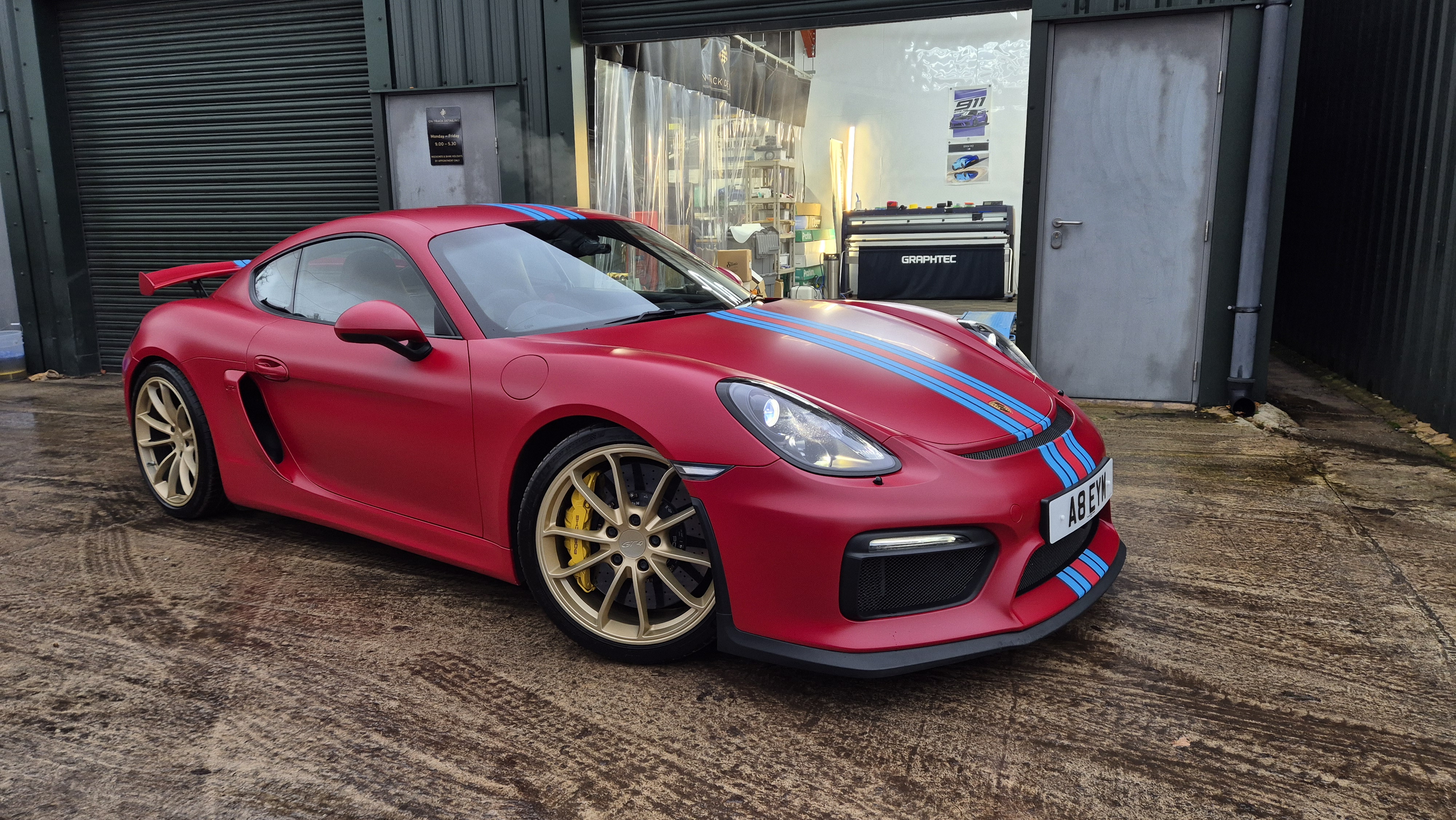 Porsche Cayman GT4 Complete Stealth PPF conversion with modified patterns, bespoke graphics and ceramic coating at On Track Detailing in Berkshire, near Wokingham and Reading 