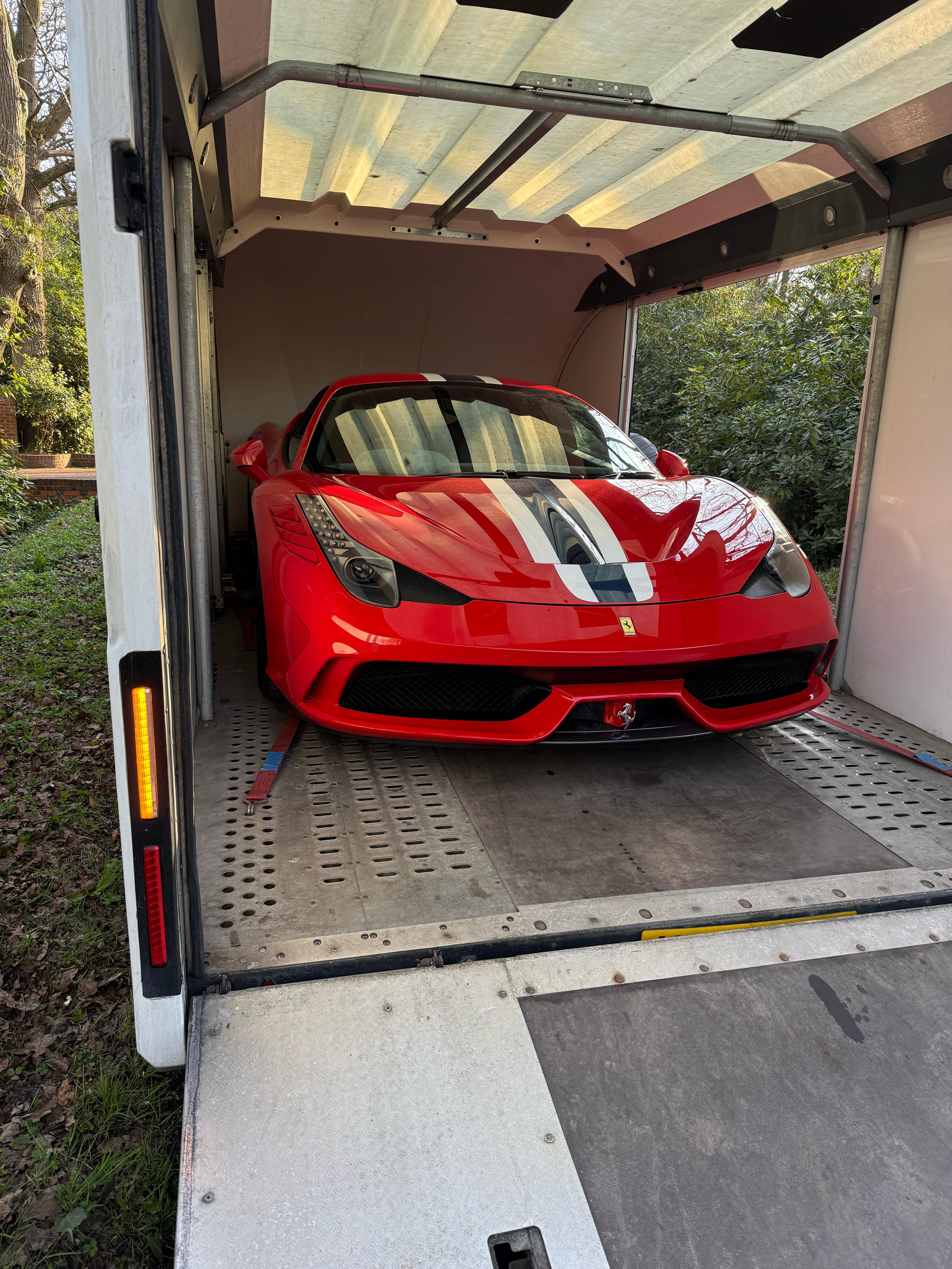 Fully enclosed transportation for a Ferrari 458 Speciale in for Paint Protection Film (PPF) install