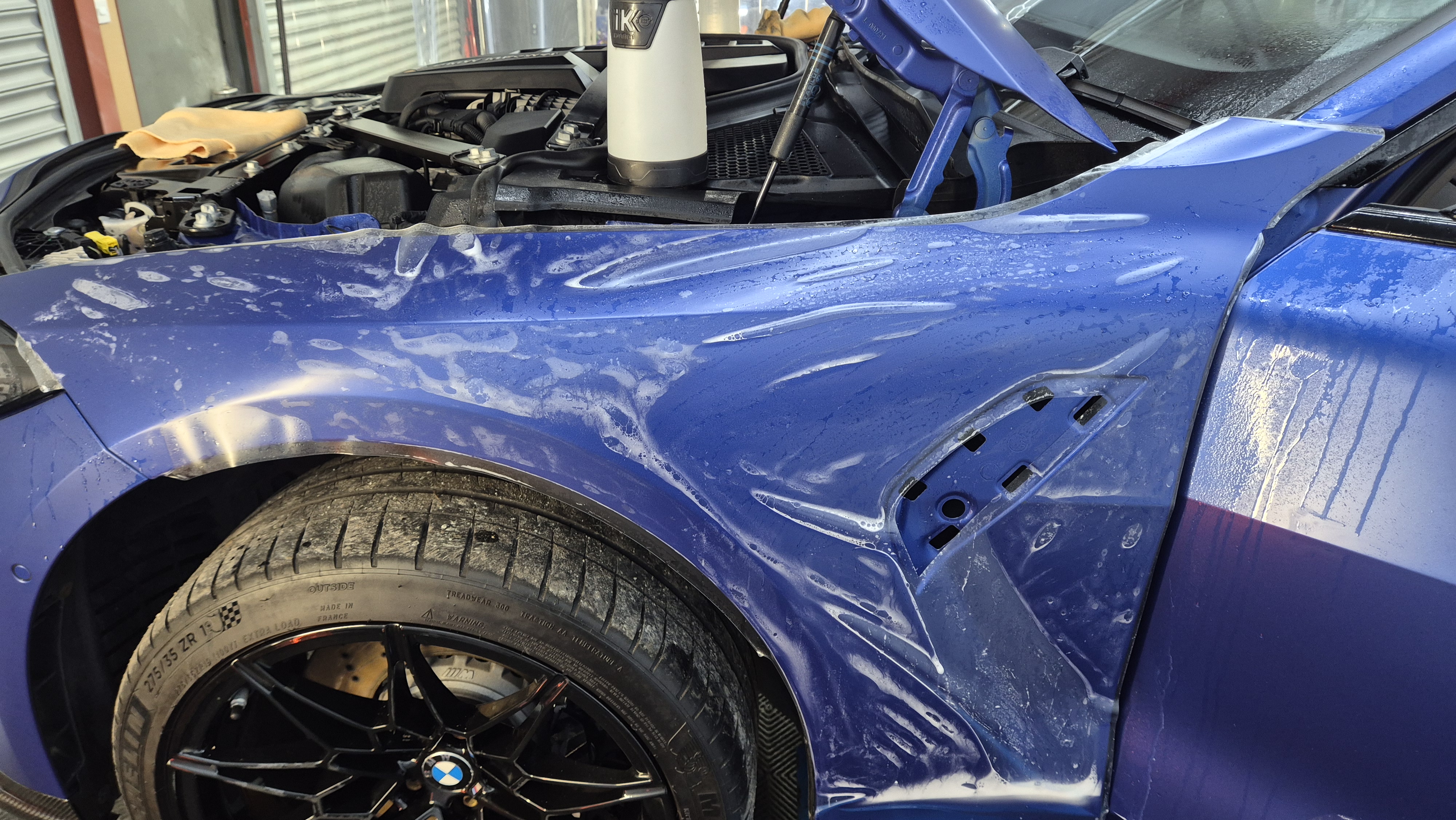 Paint Protection Film installation on a Frozen Portimao Blue BMW M4 G82