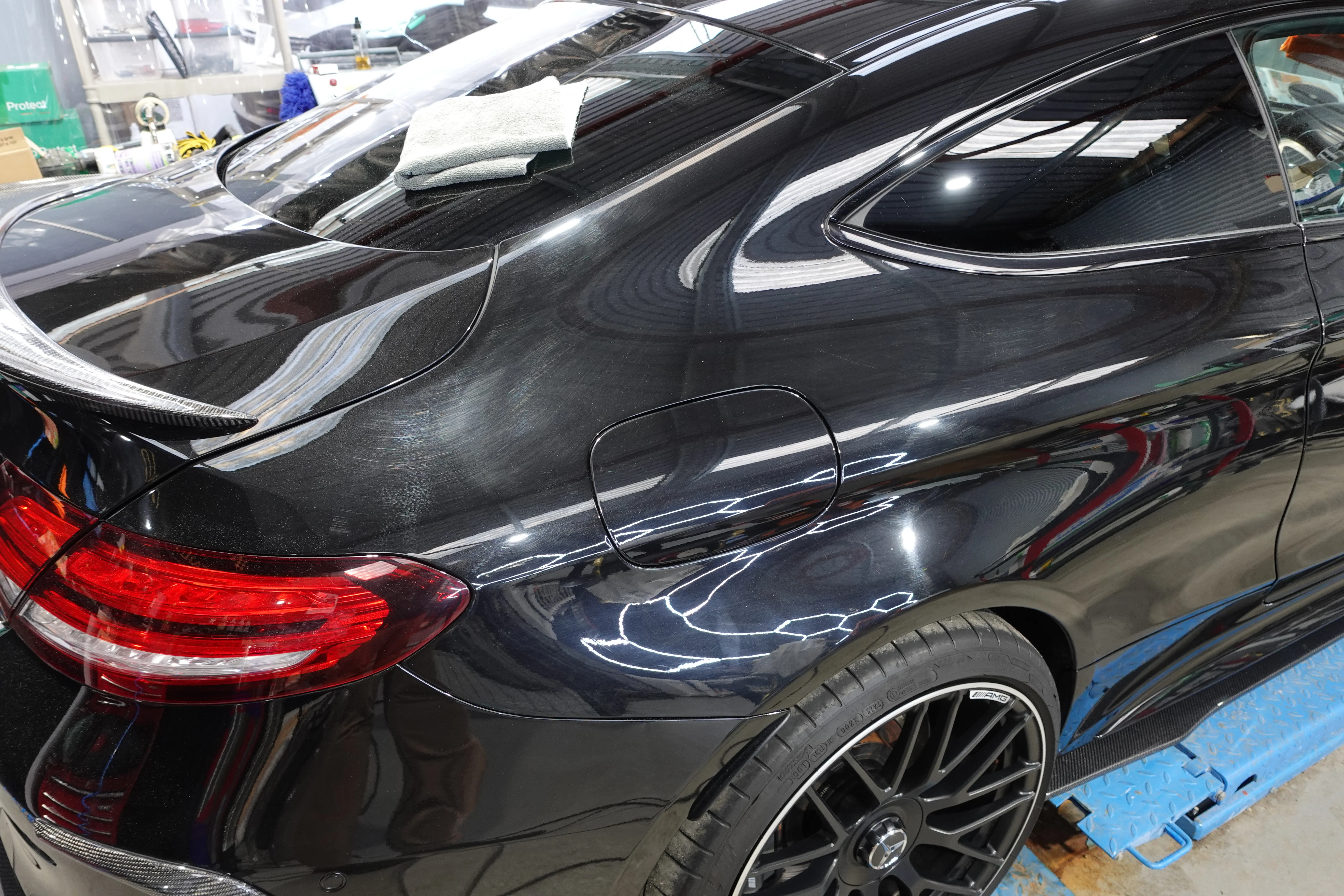 Mercedes C63, Before Paint correction and machine polishing to restore gloss, remove swirl marks. Work carried out at On Track Detailing in Berkshire, Wokingham. Near Reading, Basingstoke and Bracknell