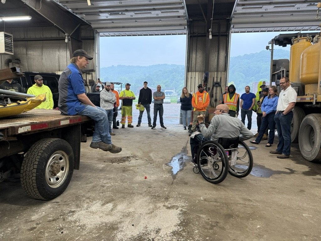 Employees gathered in a circle