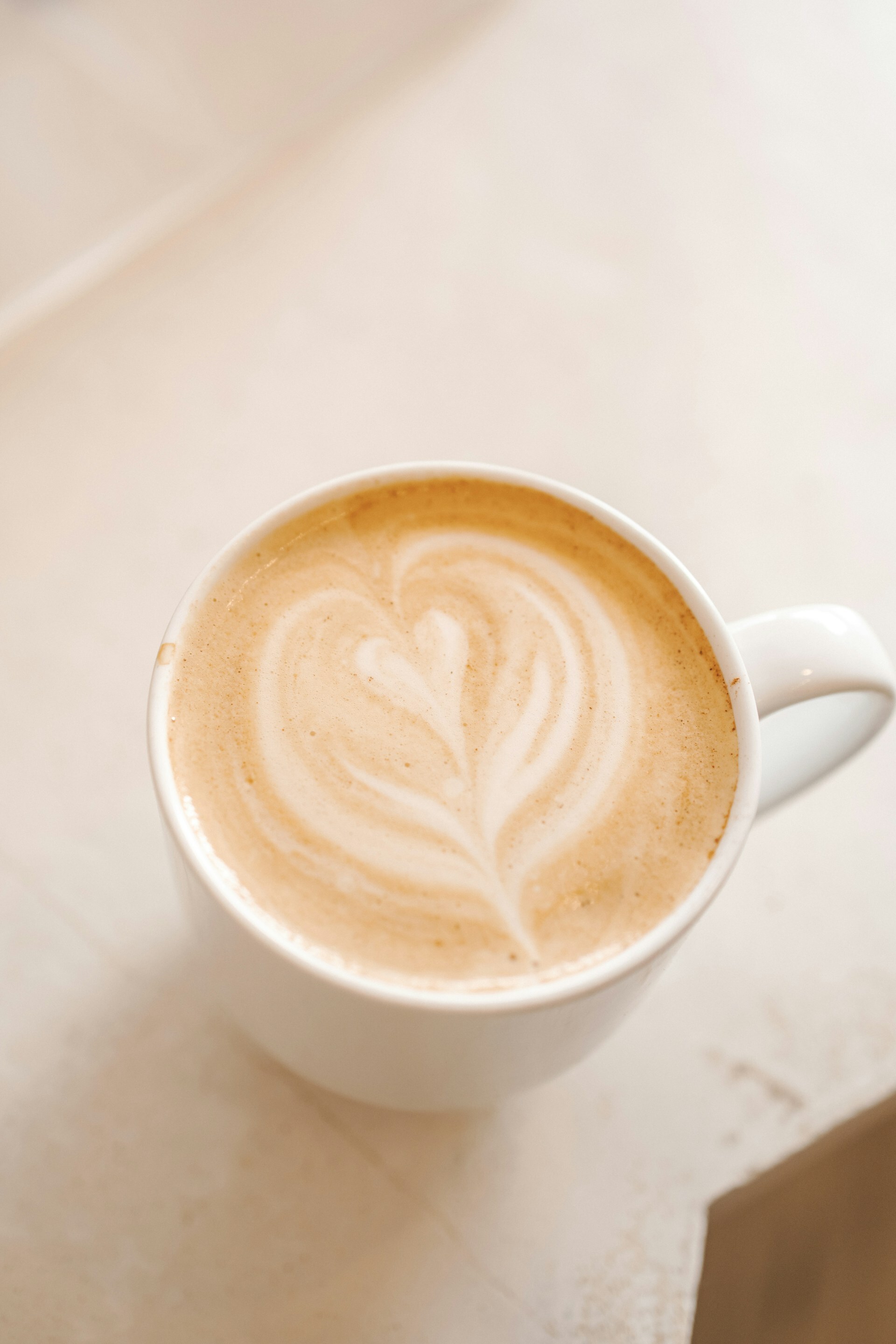A latté in a white cup