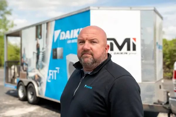 team member and service van