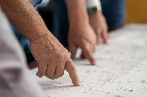 finger tips showing on paper