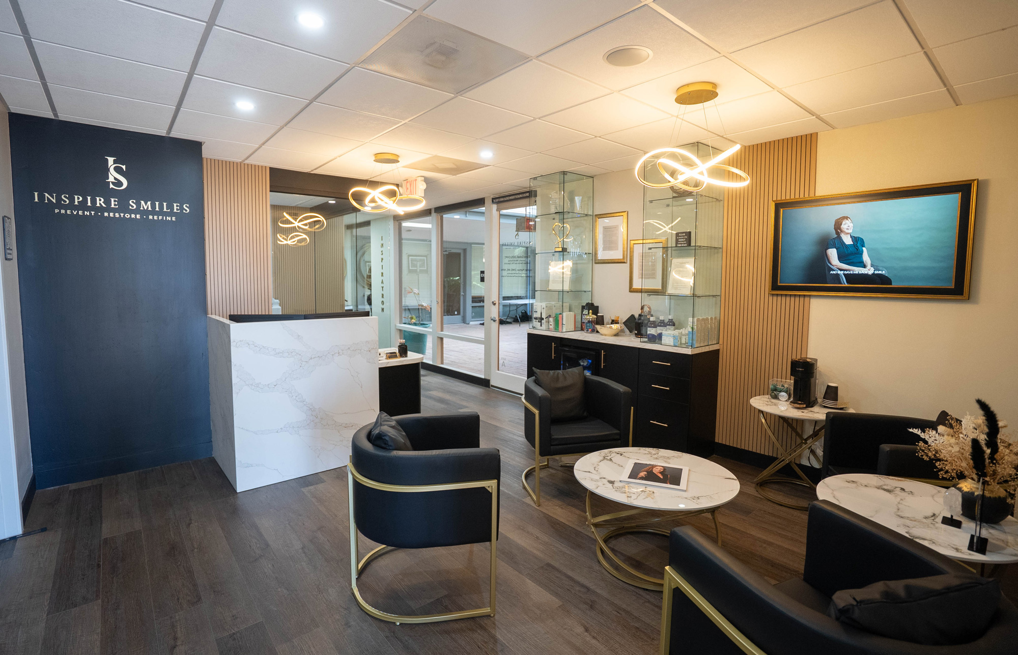 Reception desk and patient lounge at Inspire Smiles in Solana Beach, CA