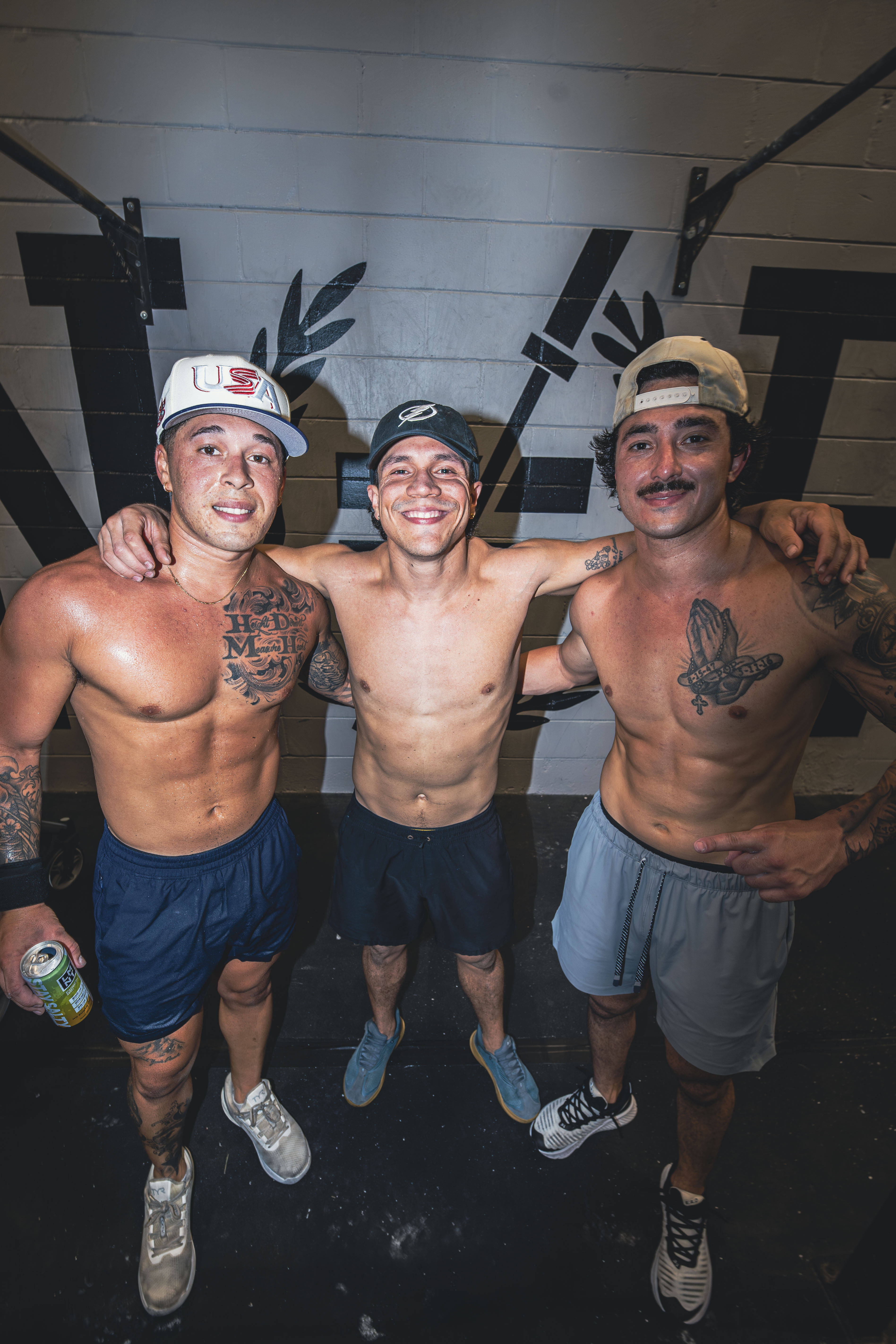 Three Friends smiling for photo after workout