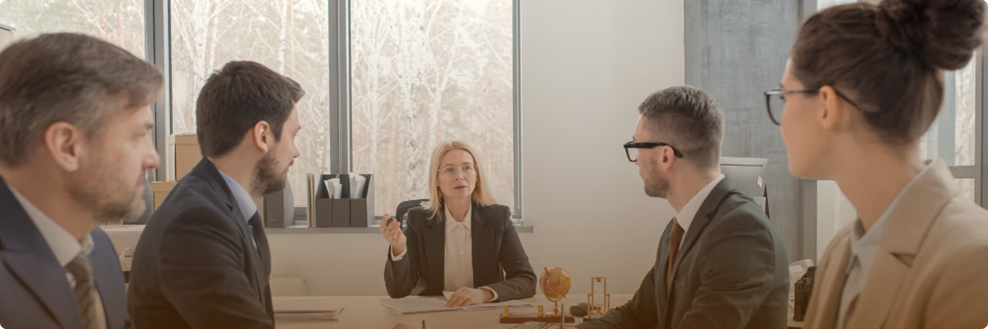 group of attorneys talking in a office setup.