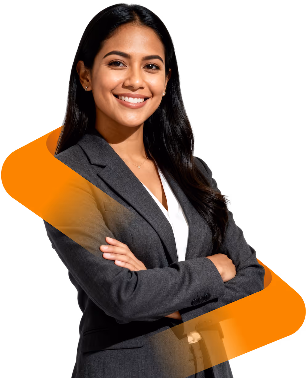 Smiling confident woman in a dark gray business suit with arms crossed.