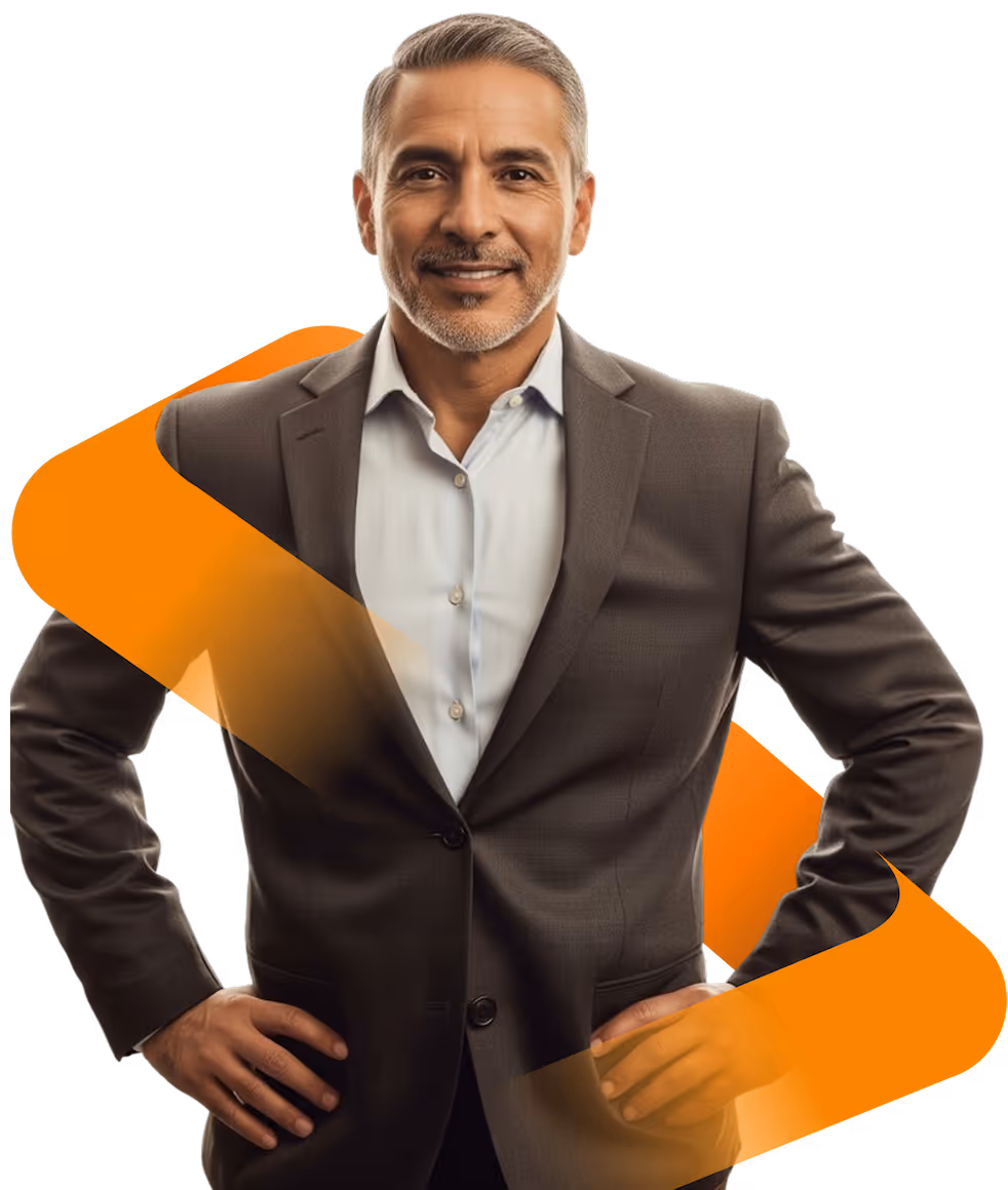 Confident middle-aged man in a dark suit with hands on hips and slight smile.