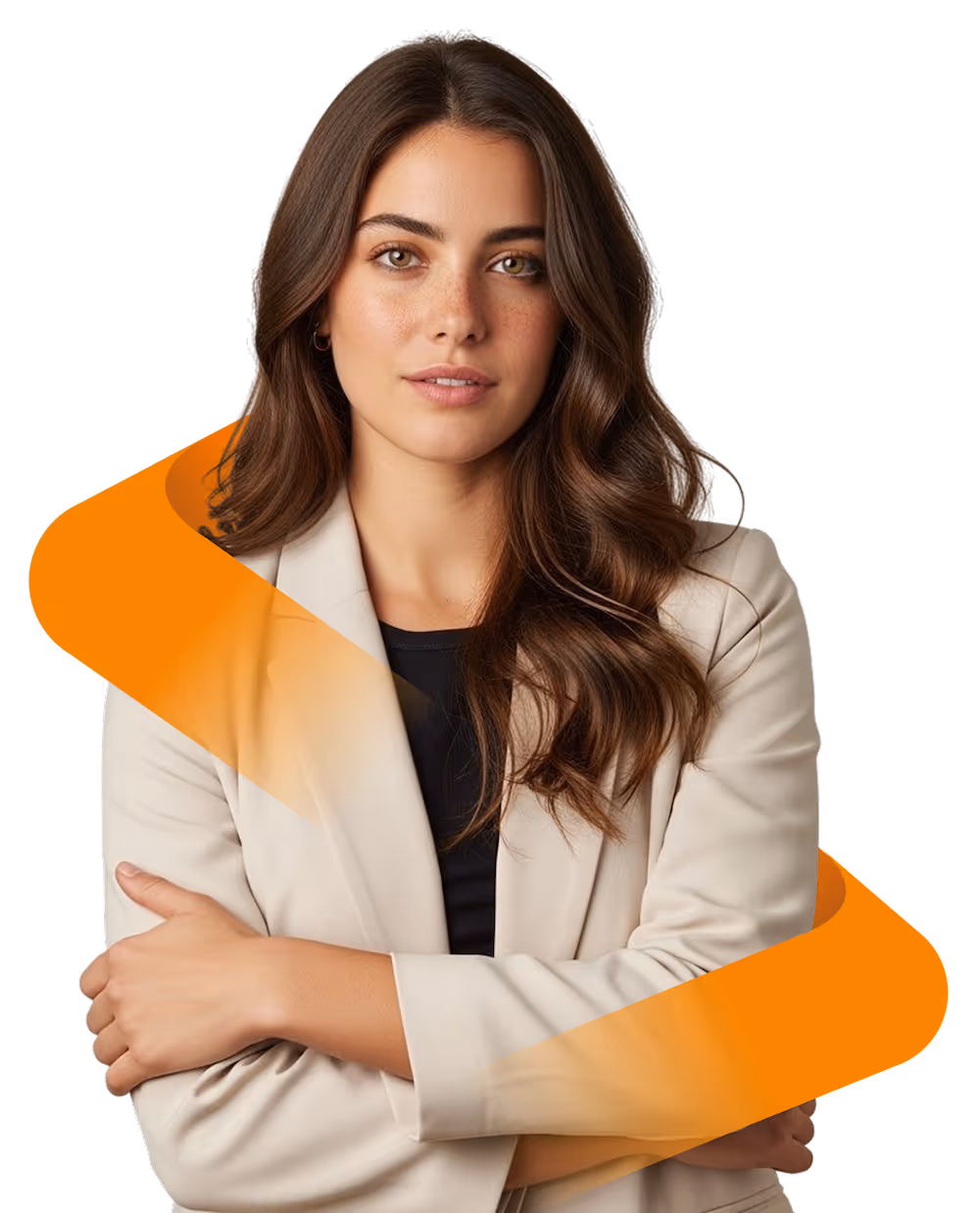 Confident woman with long wavy brown hair wearing a beige blazer and black top with arms crossed.