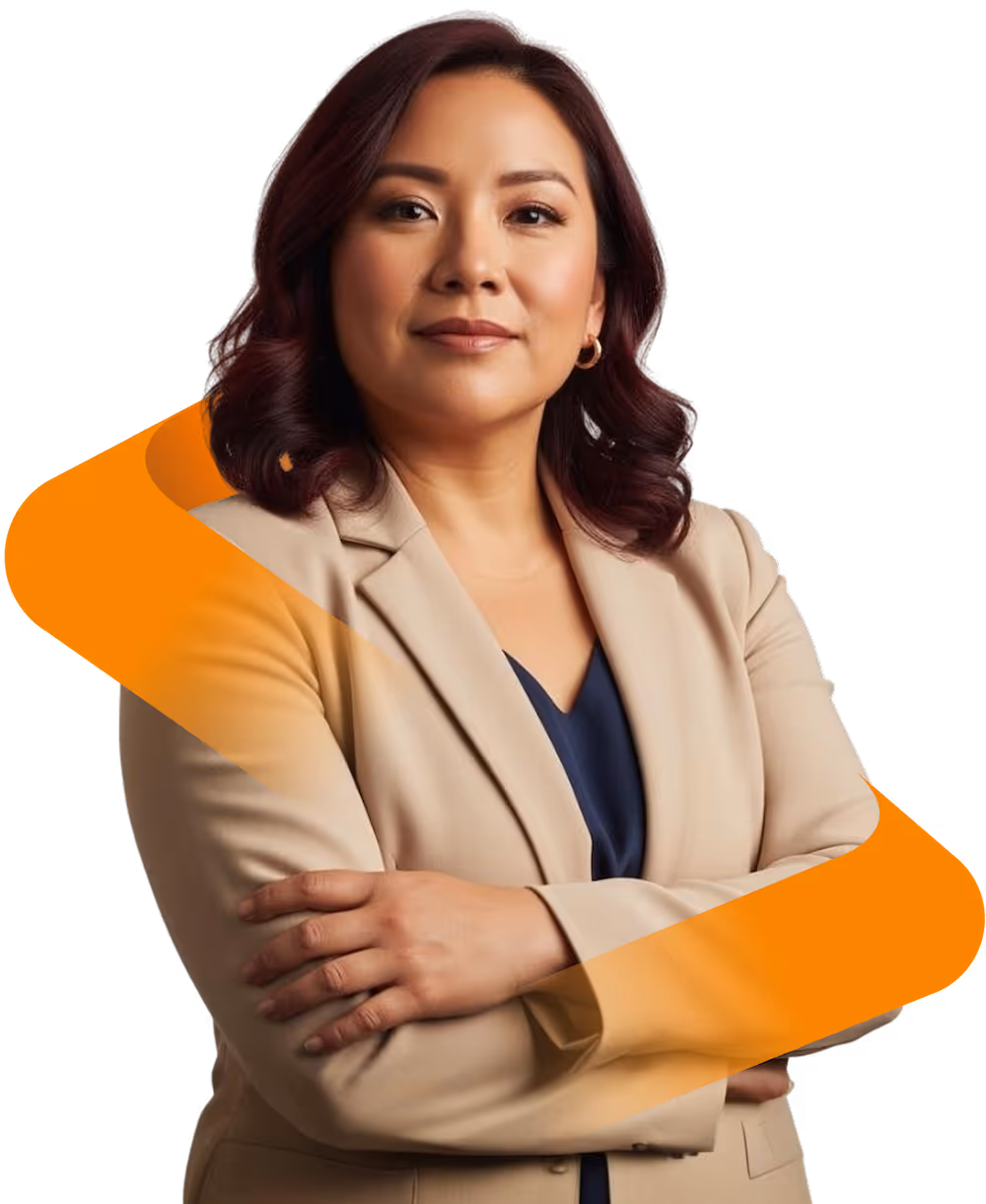Portrait of confident woman with crossed arms wearing beige blazer and navy top.