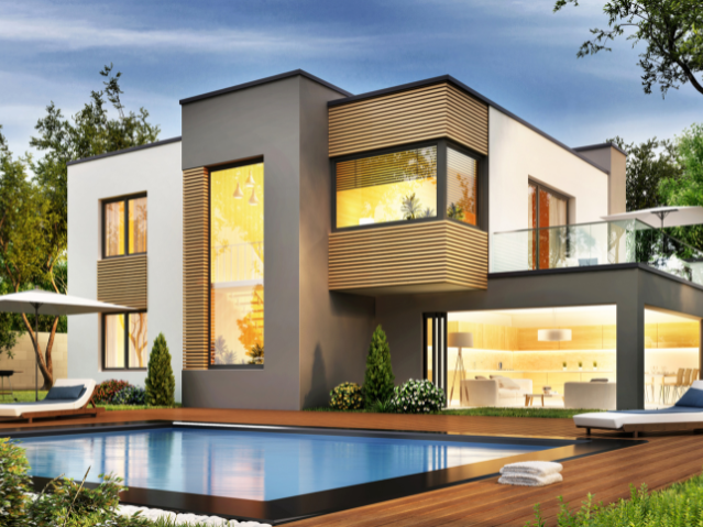 Maison moderne à deux étages avec grandes fenêtres lumineuses, terrasse en bois, piscine rectangulaire, et mobilier de jardin sous parasol.