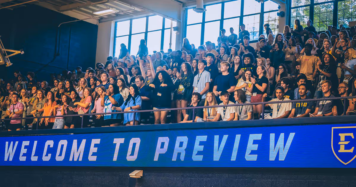 A group of new ETSU students sitting in the stands during one of the Welcome Week activities