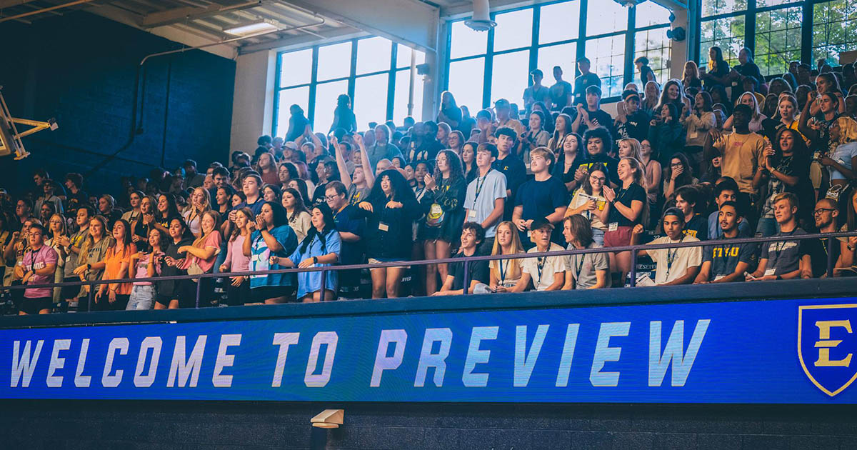 A group of new ETSU students sitting in the stands during one of the Welcome Week activities