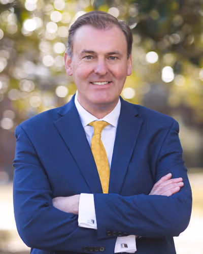 A headshot of Howard Reddy