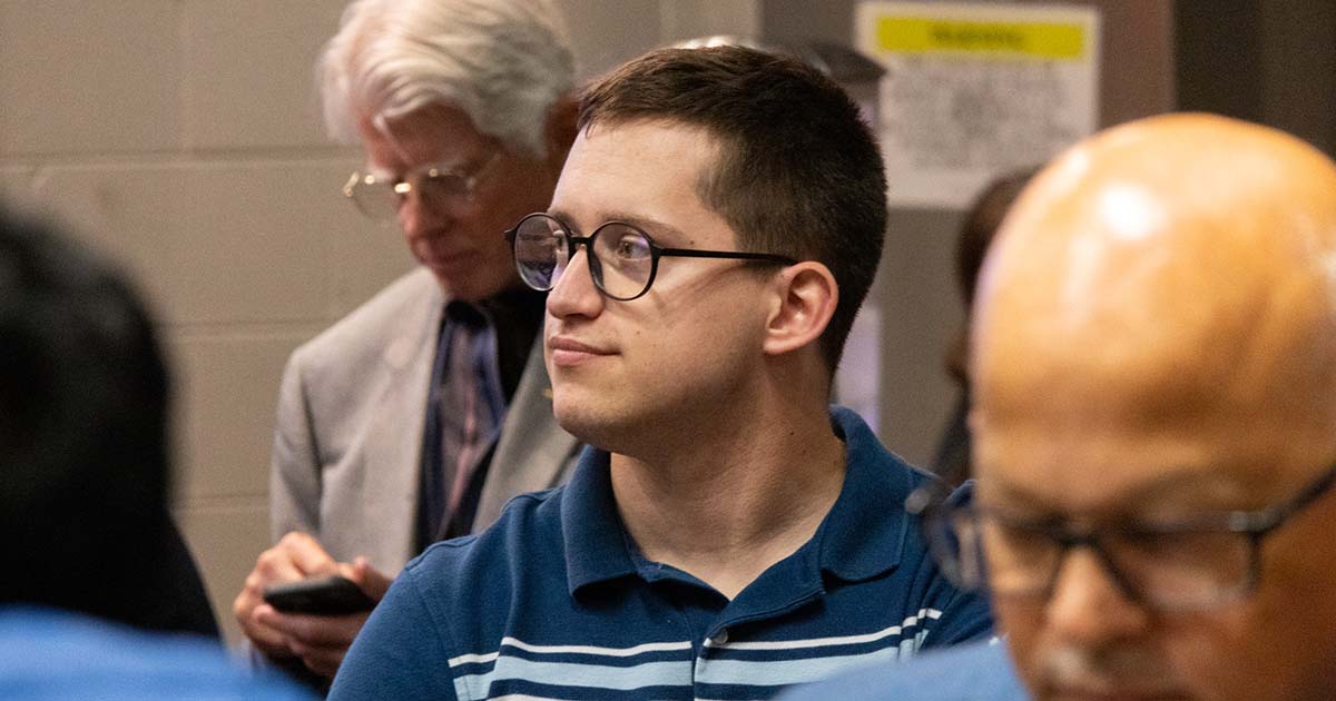 ETSU CBAB student Justin Dubin watches the presentations during the Core4ce Innovation Challenge Pitch Event.