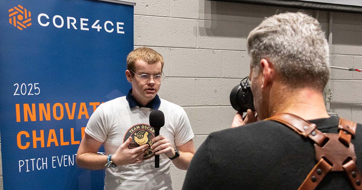 ETSU CBAT student Luke Seal answers questions during a break at the Core4ce Innovation Challenge Pitch Event.